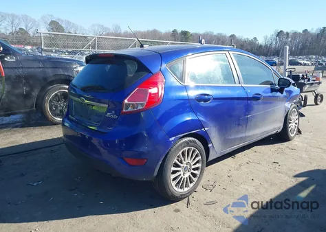 2014 Ford Fiesta Titanium z USA, uszkodzony, nr VIN 3FADP4FJ3EM176698